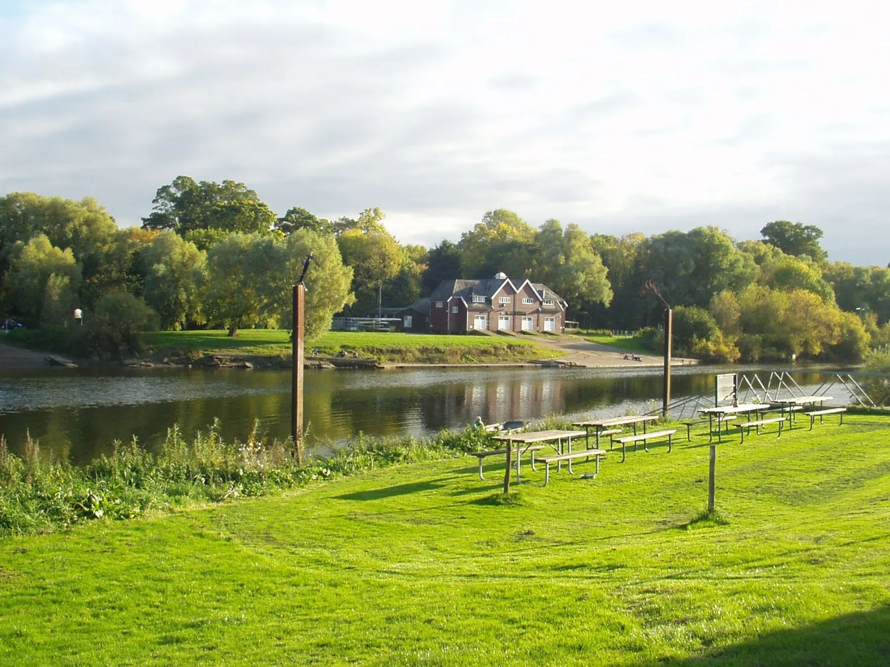 Tents on the lawn beside the River Severn