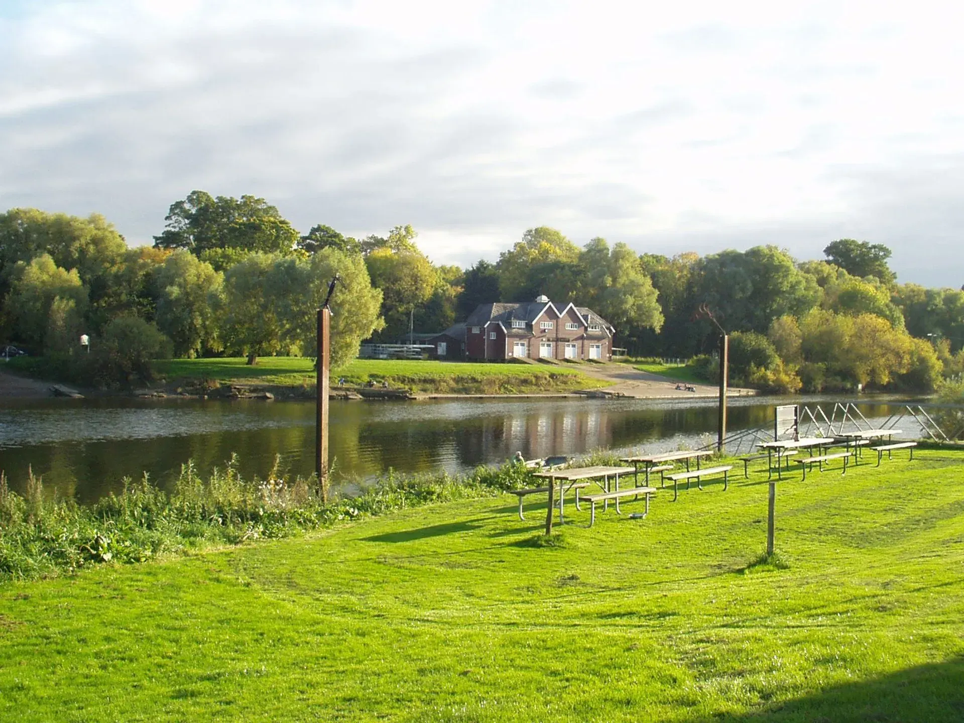 The green riverside garden at Lower Lode Inn