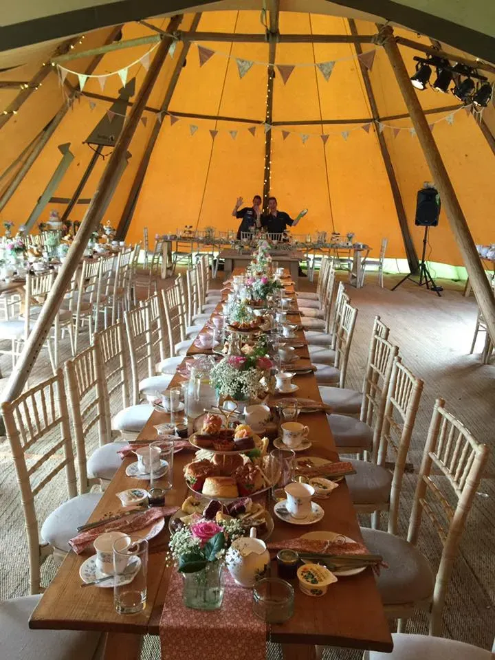A long wedding breakfast table in the function hall